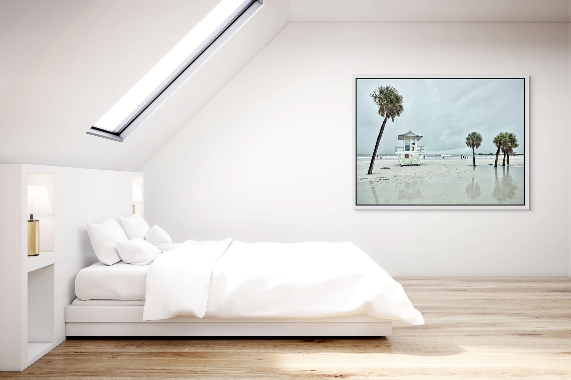 Image of beach with lifeguard stand and palm trees framed in bedroom