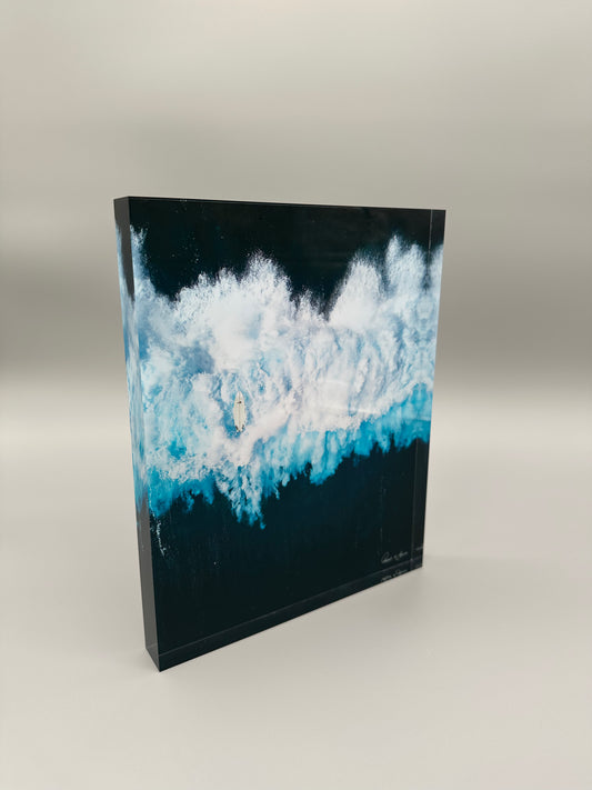 Blue and white abstract design on a dark background