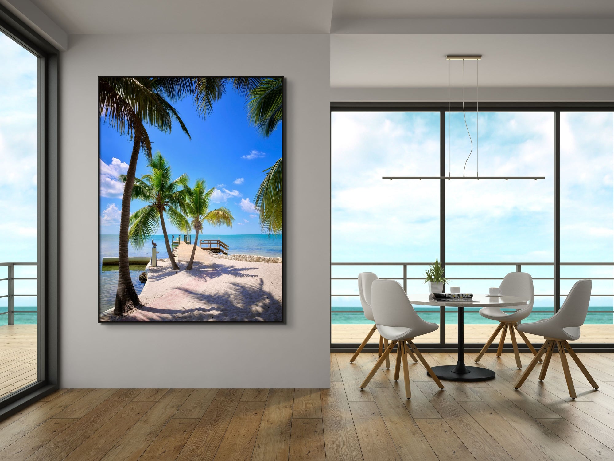 Image of palm trees and water framed by dining table
