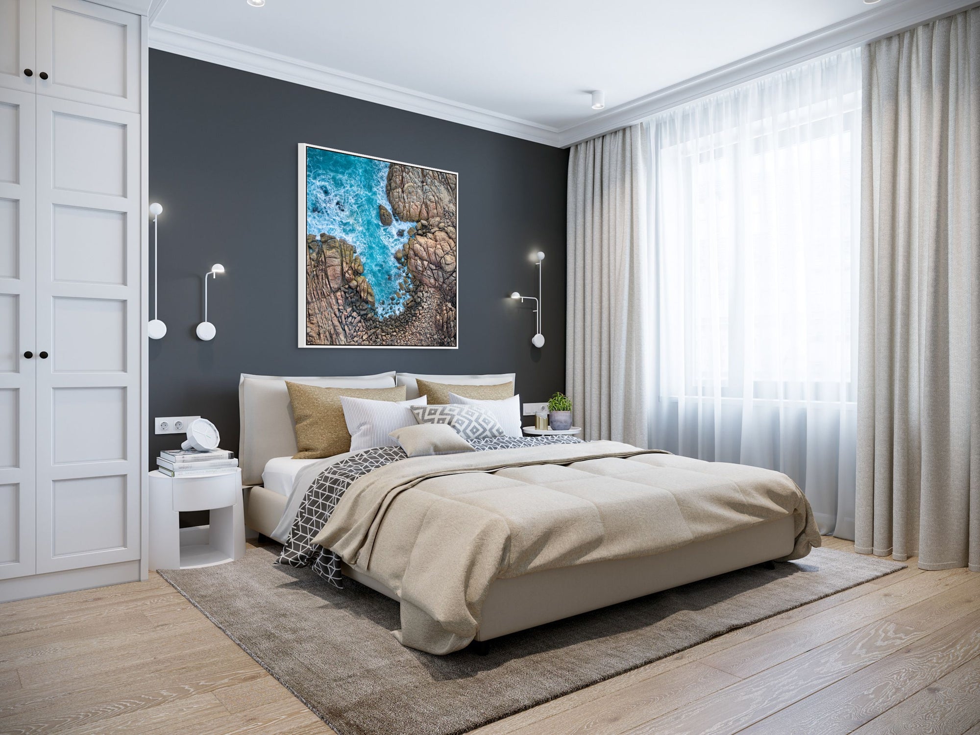 Image of Rocks and water shot from above in Australia framed above bed.