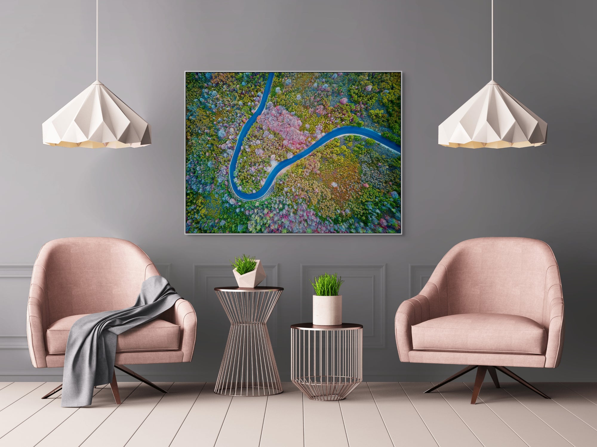 Image of a mountain road switchback photographed from above framed in a sitting room.
