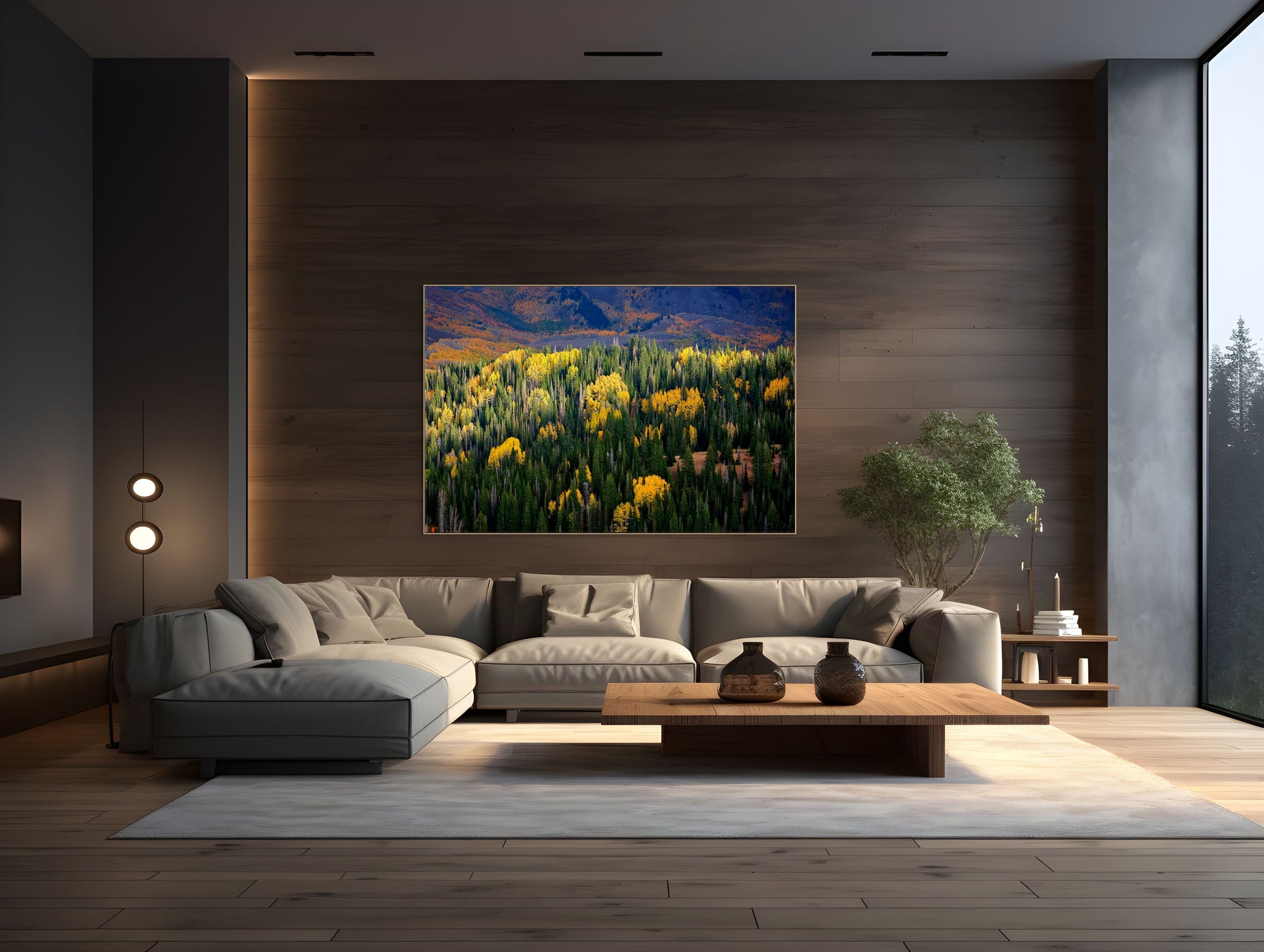 Aerial image looking down on Aspen trees and the Utah Mountains framed in a living room.