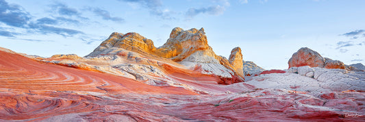 landscape image of red rocky mountains and bright blue sky