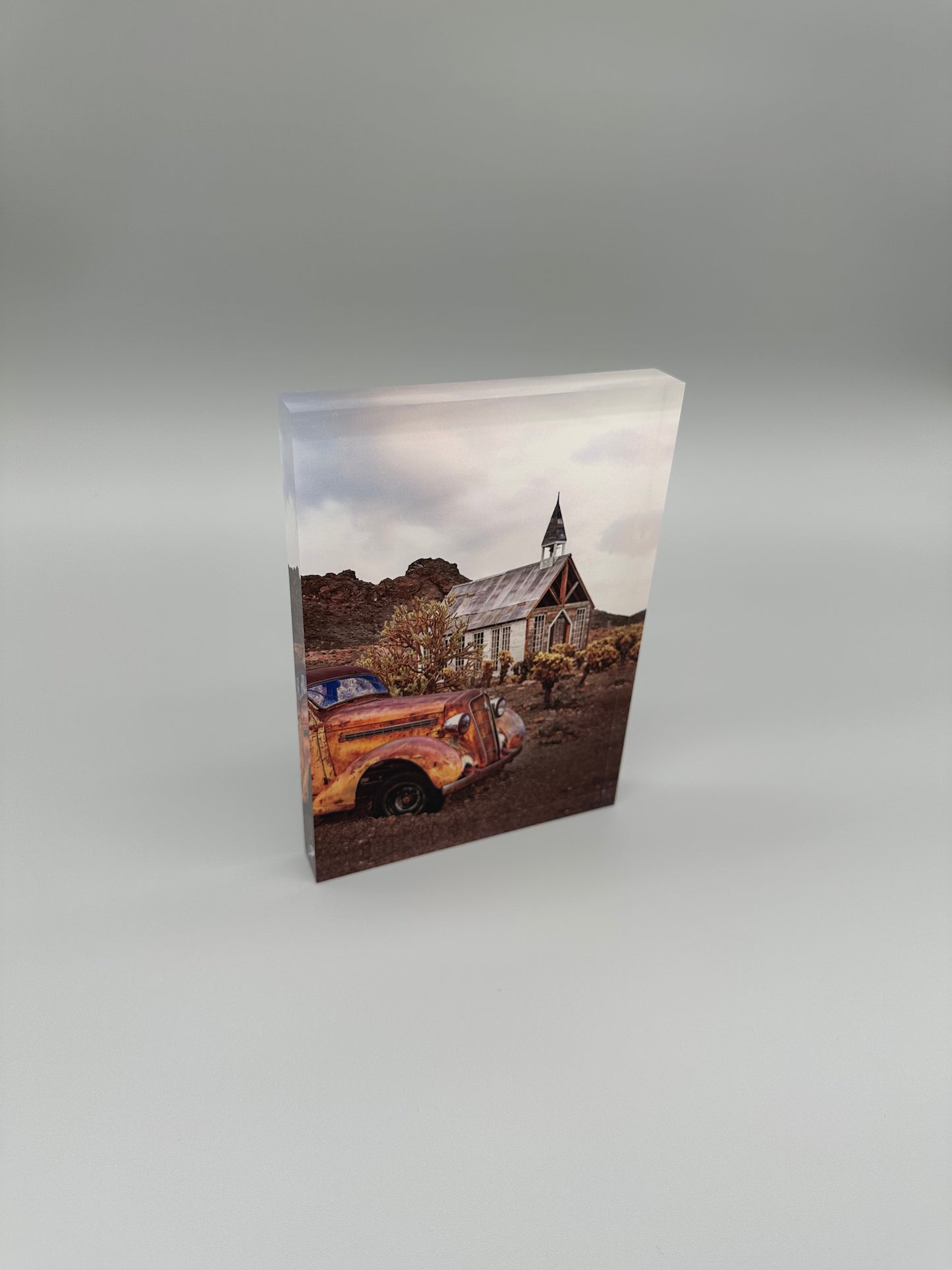 Acrylic block with a vintage car and church scene