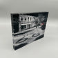Acrylic block with a black and white photo of a street scene